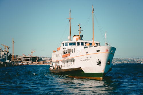 Ship Sailing off from Harbor