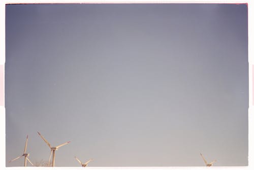 Windmills on Blue Sky
