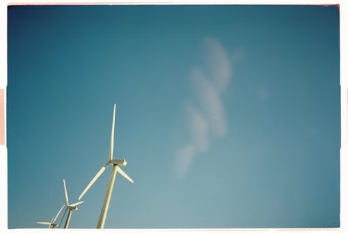 Windmills on Blue Sky