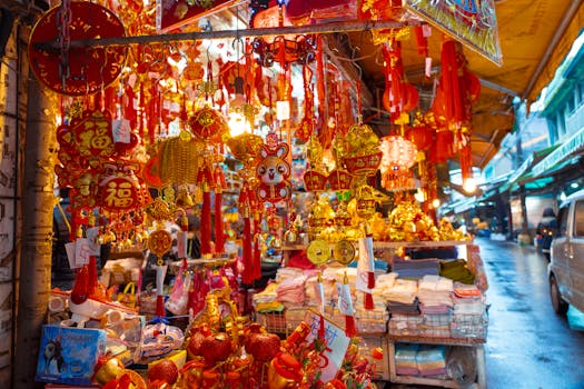 Vibrant market stall filled with Asian cultural decorations, glowing in warm light.