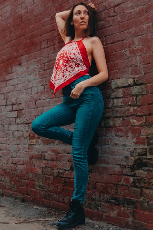 Slim Woman Posing in Jeans · Free Stock Photo