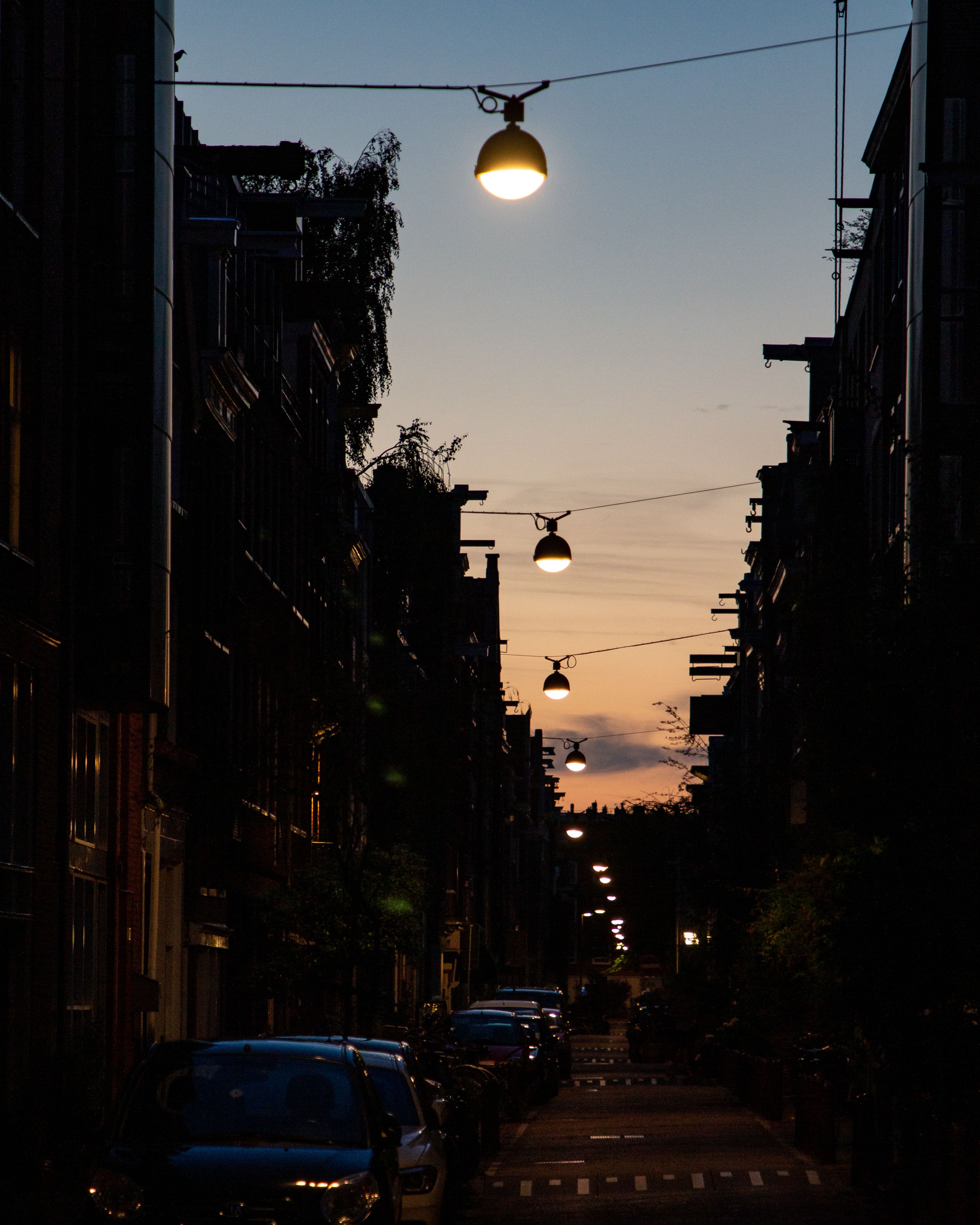 Cars Parked on the Sides of a City Street · Free Stock Photo
