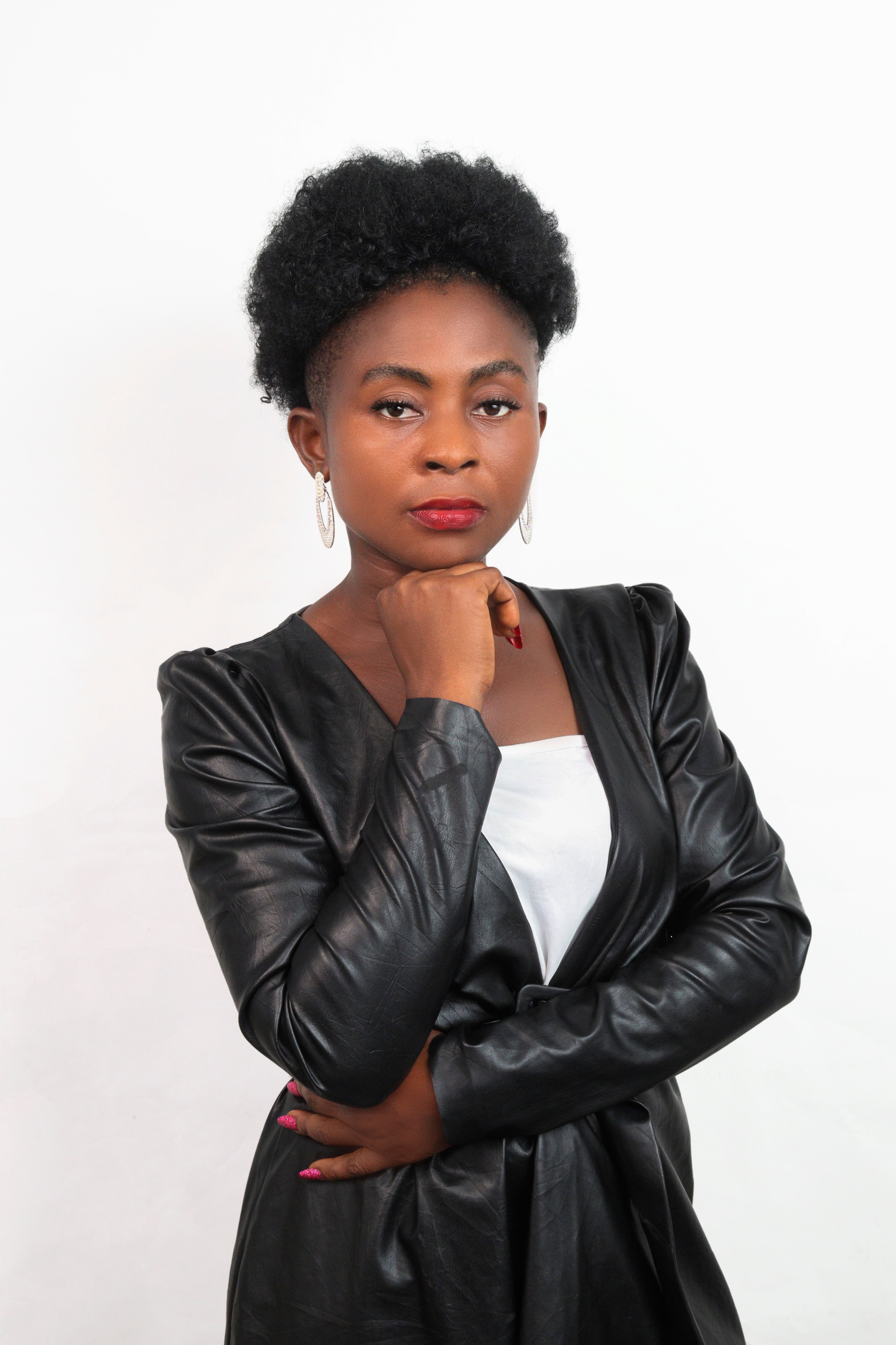 Portrait of a Woman in a Leather Jacket · Free Stock Photo