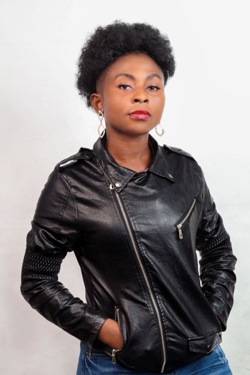 Studio Portrait of a Woman in a Leather Jacket · Free Stock Photo