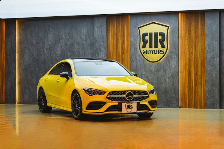 Yellow Mercedes Benz In A Showroom