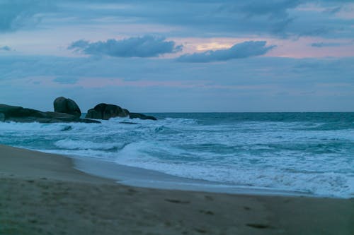 Gratis stockfoto met amantes de la playa, aqua, avondzon Stockfoto