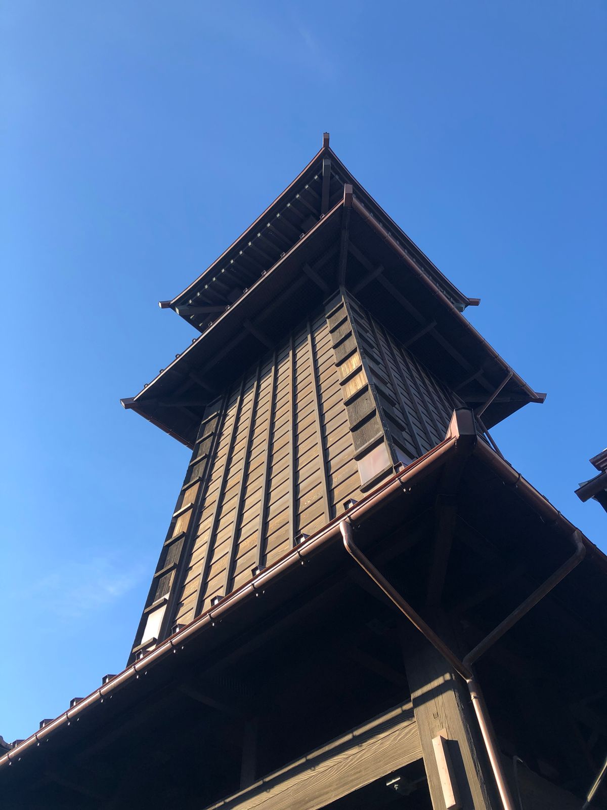 Toki no Kane (Time Bell Tower) in Kawagoe from low angle — the 1624 landmark against blue sky