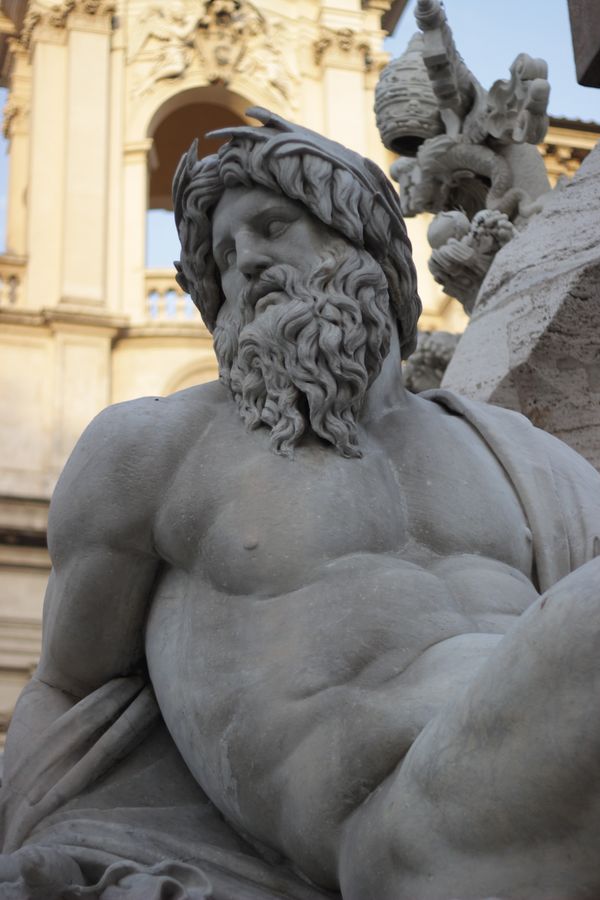 Zeus Italian Zeus Statue in Bernini's Fountain of the Four Rivers in Rome Italy ...