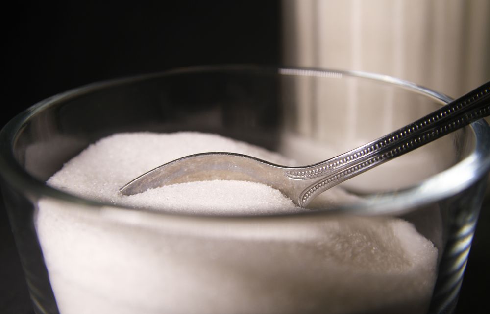 Refined White Sugar in Glass Bowl