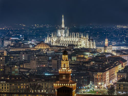Milan Cathedral over City at Night