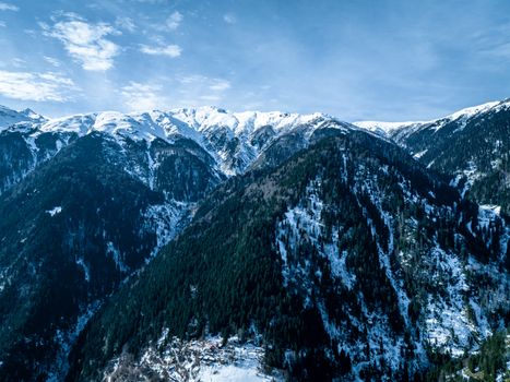 Stunning aerial view of snowcapped mountains in Çamlıhemşin, Rize, Türkiye.
