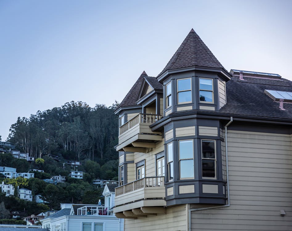 Wooden House with Glass Windows and Balconies 