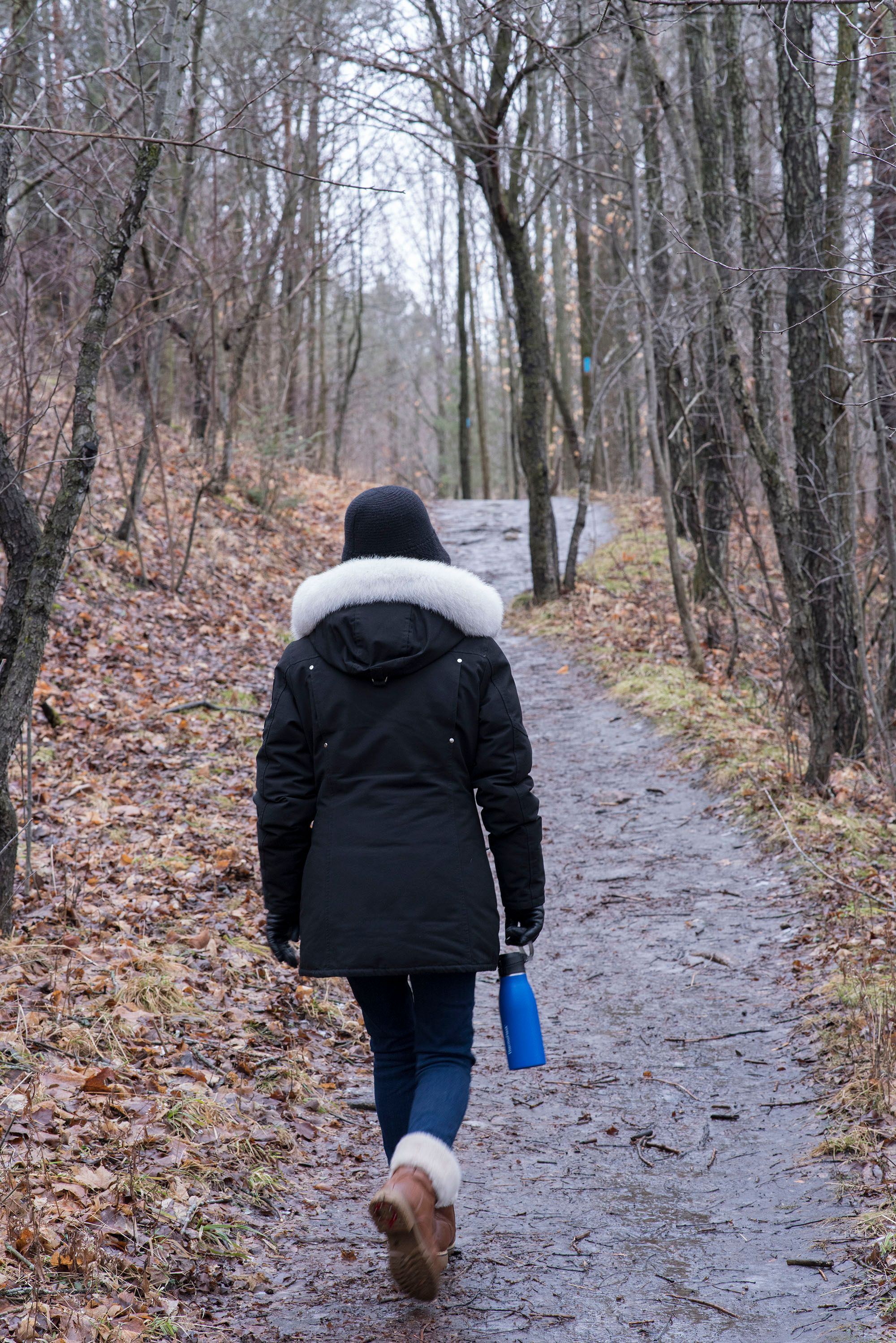 A Person in Jacket while Walking on the Pathway · Free Stock Photo
