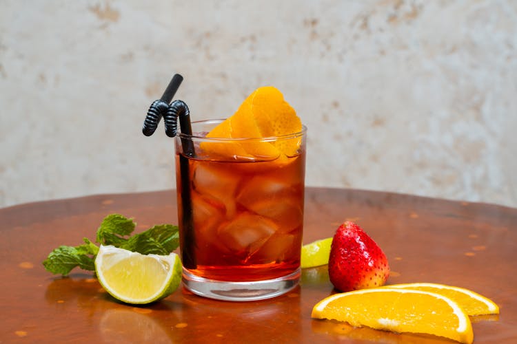 Photo Of A Cocktail Drink Near Fruits