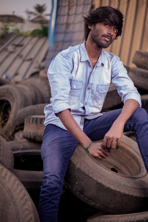 Man in Denim Shirt Looking Away