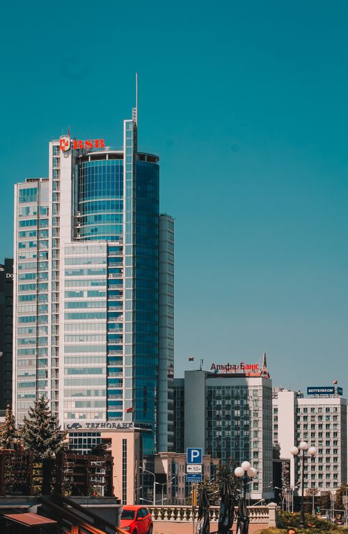 Free Vibrant cityscape of modern skyscrapers in Minsk, capturing urban architecture under a clear sky. Stock Photo