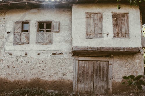 Abandoned House with Broken Windows