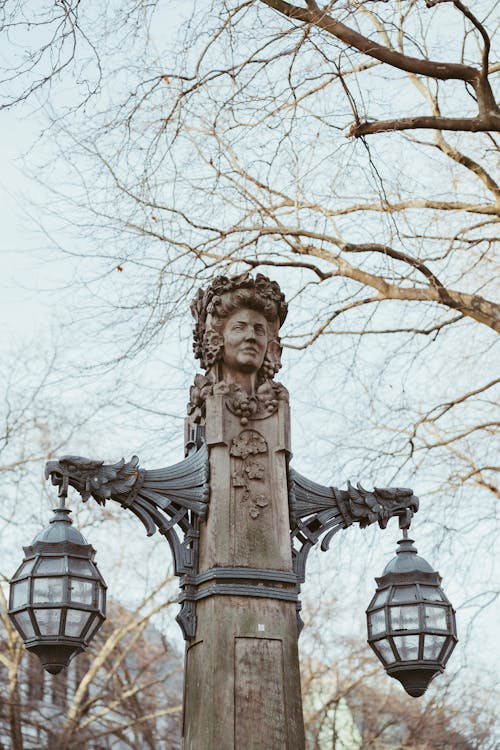 Statue with Hanging Lanterns 