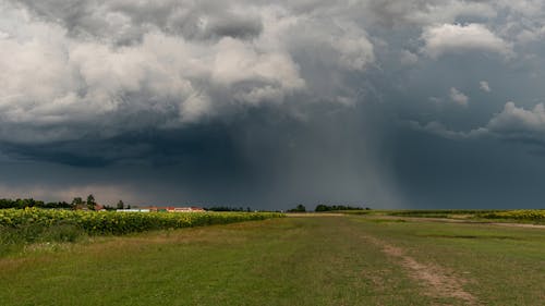 Agricultural Farmland Landscape Under Dark Clouds