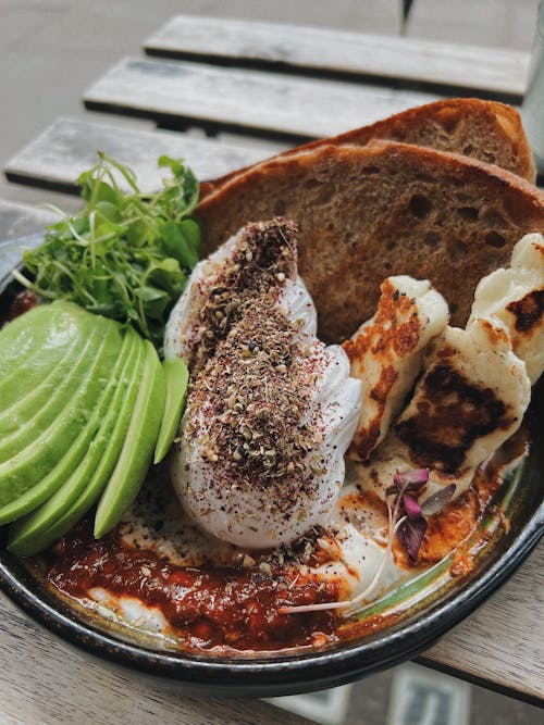 Dish with Avocado, Cheese and Bread