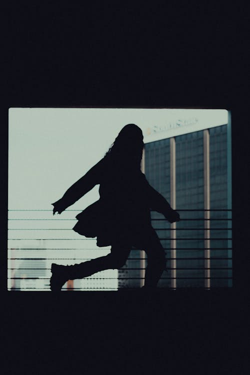 Silhouette of Running Woman