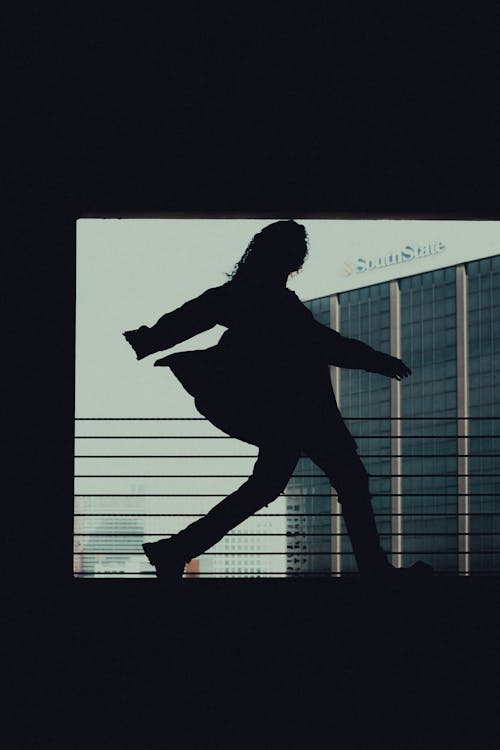 Silhouette of Woman in Jacket