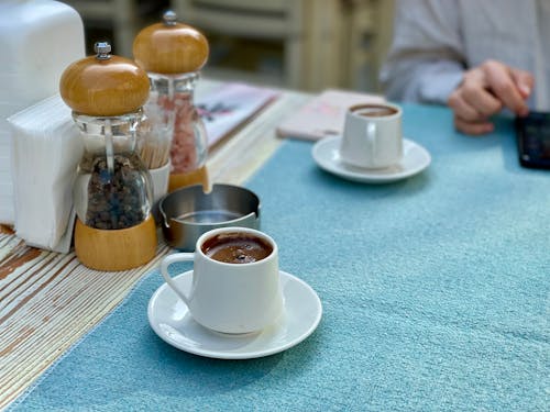 Two Cups of Coffee on a Table 