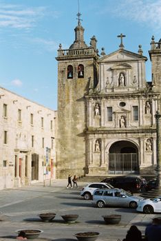 Capture of the historic Viseu Cathedral in Portugal with sunny skies and architectural details.