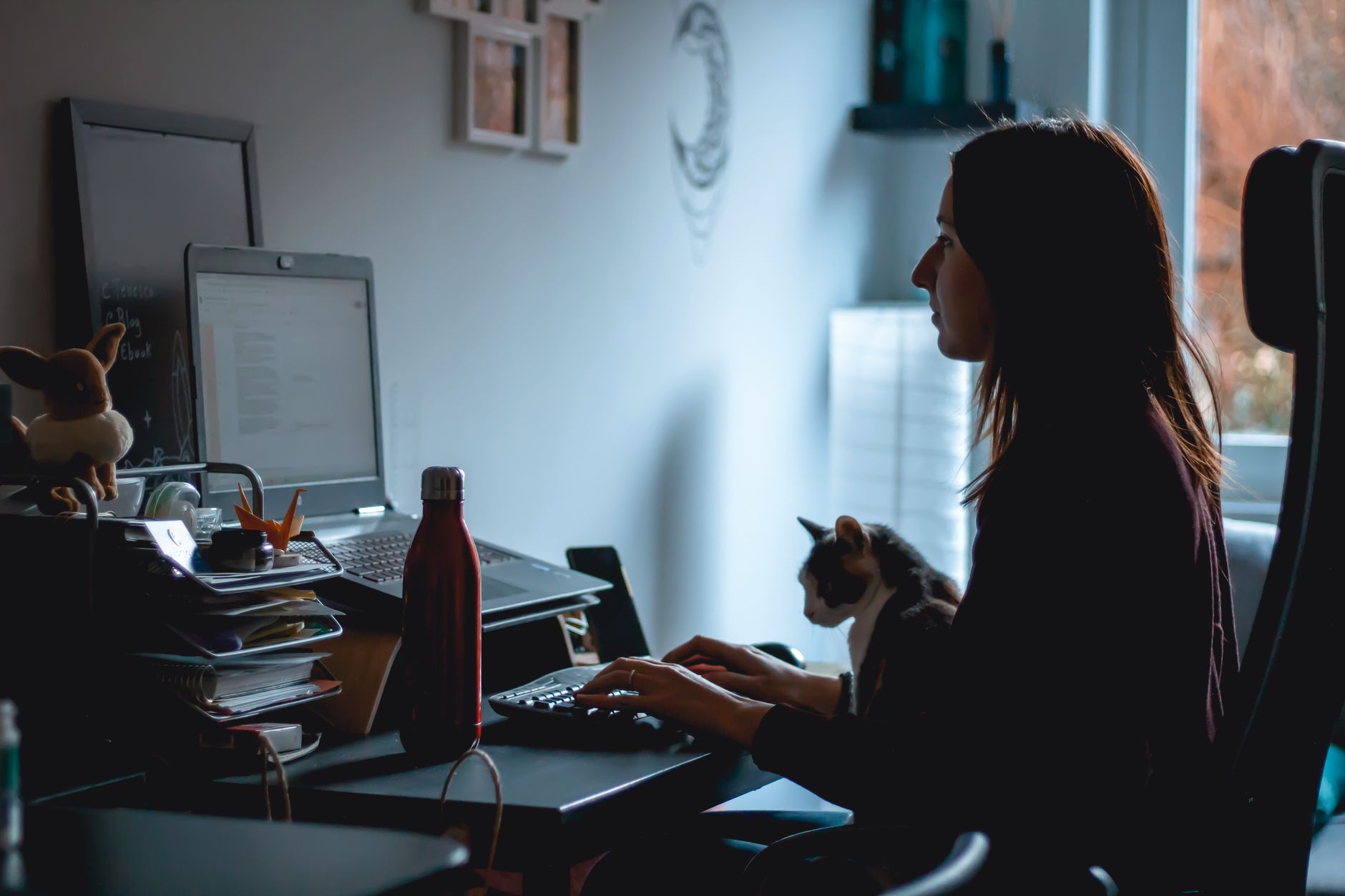 A quiet home office with race notes, calculator, and a responsible betting budget worksheet