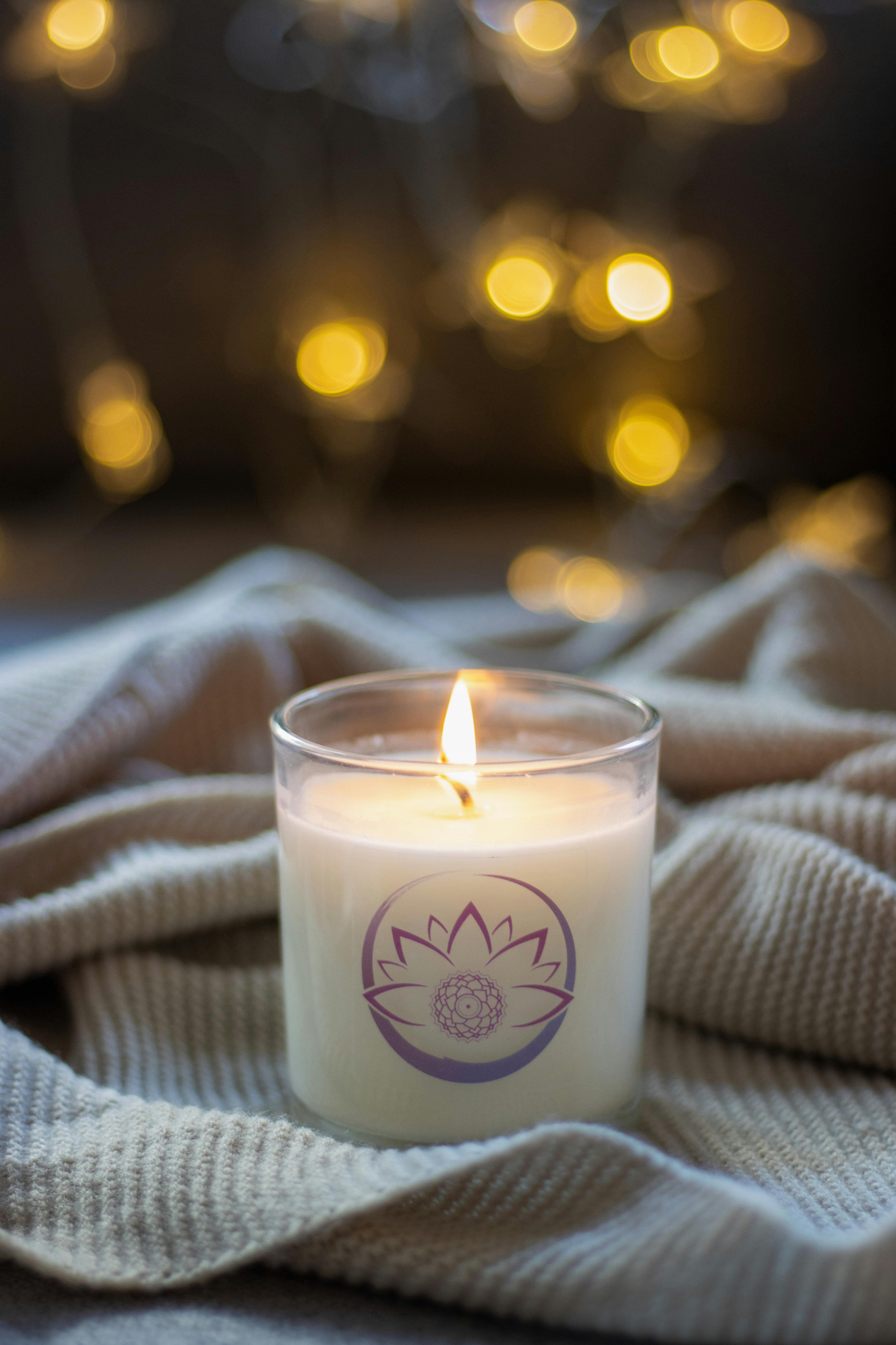 Selective Focus Photography of Candles ·