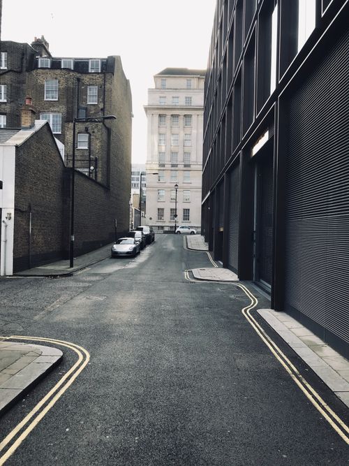 Free Discover a tranquil, narrow alley in the heart of London, captured on a quiet day. Stock Photo