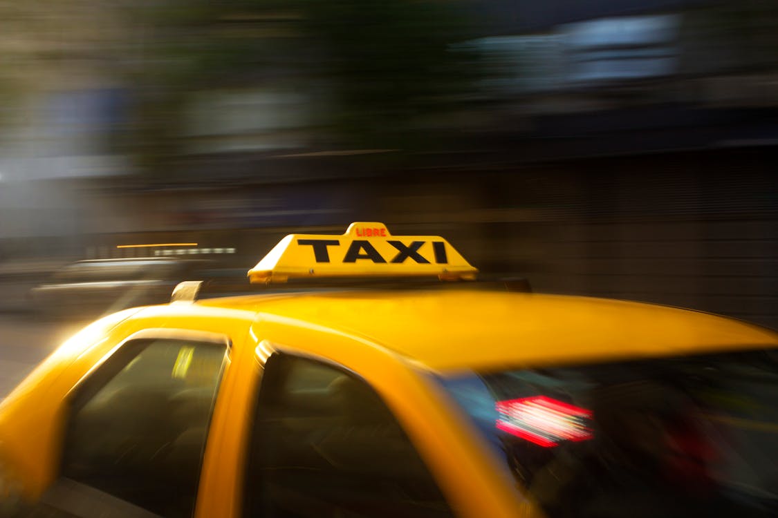 Free Panningfotografie Van Yellow Taxi Stock Photo