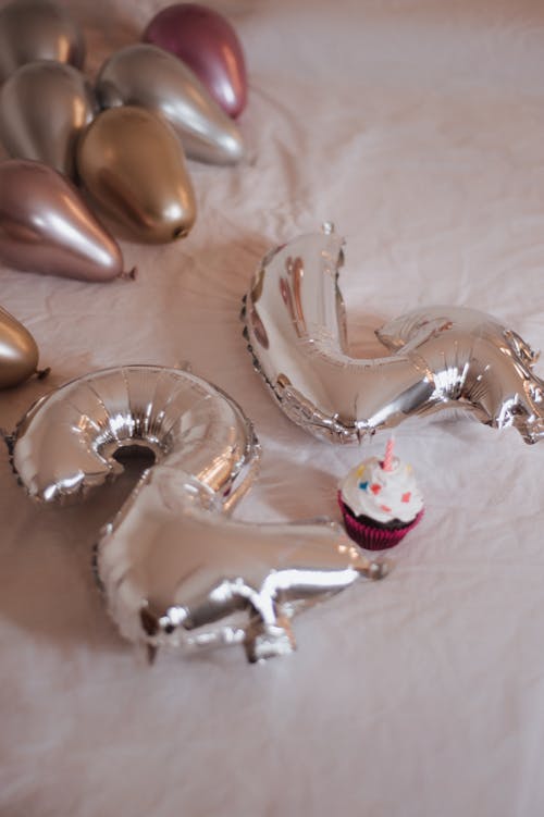 Silver 24th Birthday Balloons and Small Cupcake with Candle