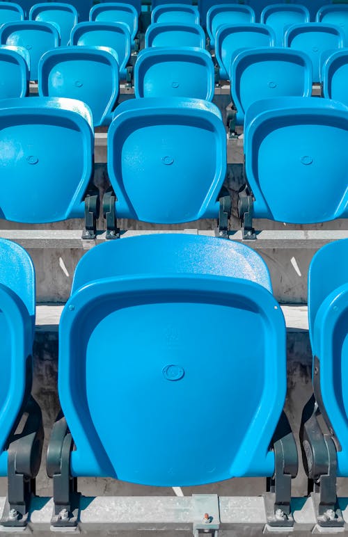 Gratis stockfoto met arena, blauwe stoelen, kunststof