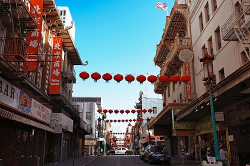 Kostnadsfri bild av amerikanska flaggan, byggnader, chinatown