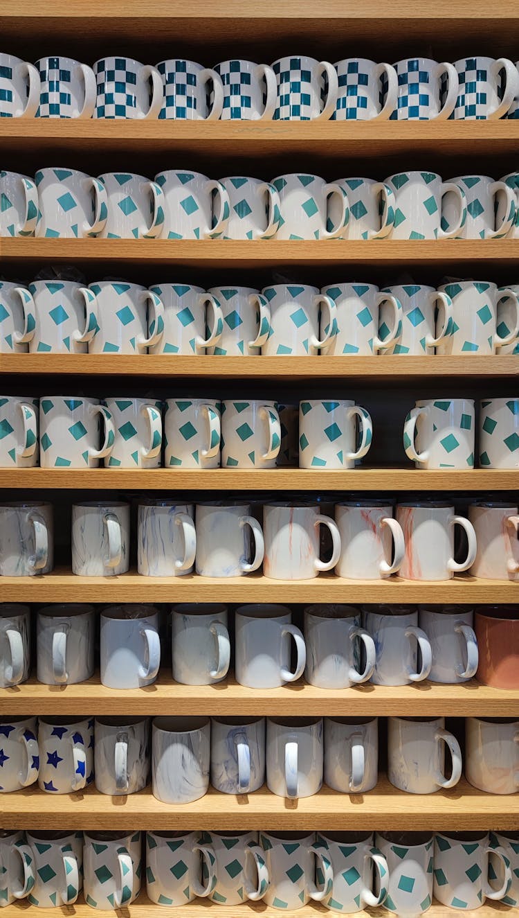 Mugs On A Shelf In A Store 