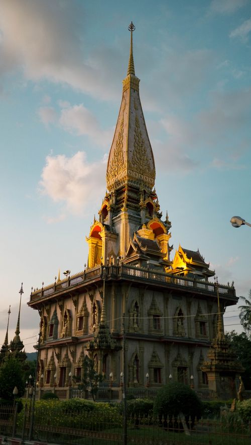 Free Capture of Wat Chalong, a famous Buddhist temple in Phuket, Thailand, under a vibrant sky. Stock Photo