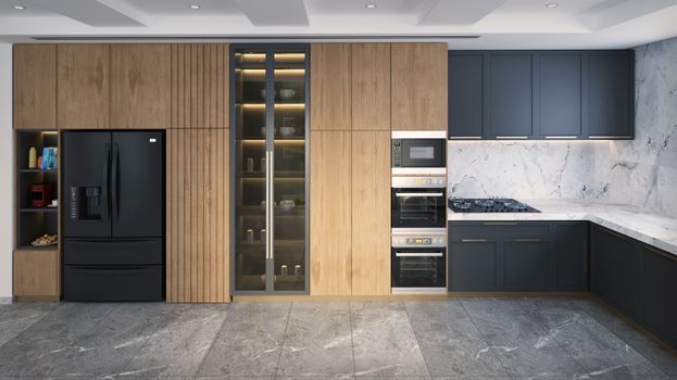 A contemporary kitchen interior featuring wood cabinets and modern appliances with a marble backsplash.