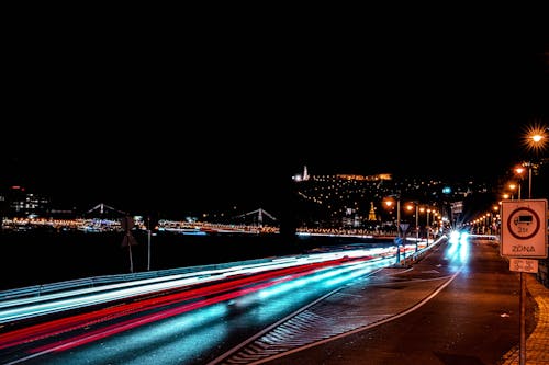 Free Long-exposure Photography of Light Streaks on Road Stock Photo