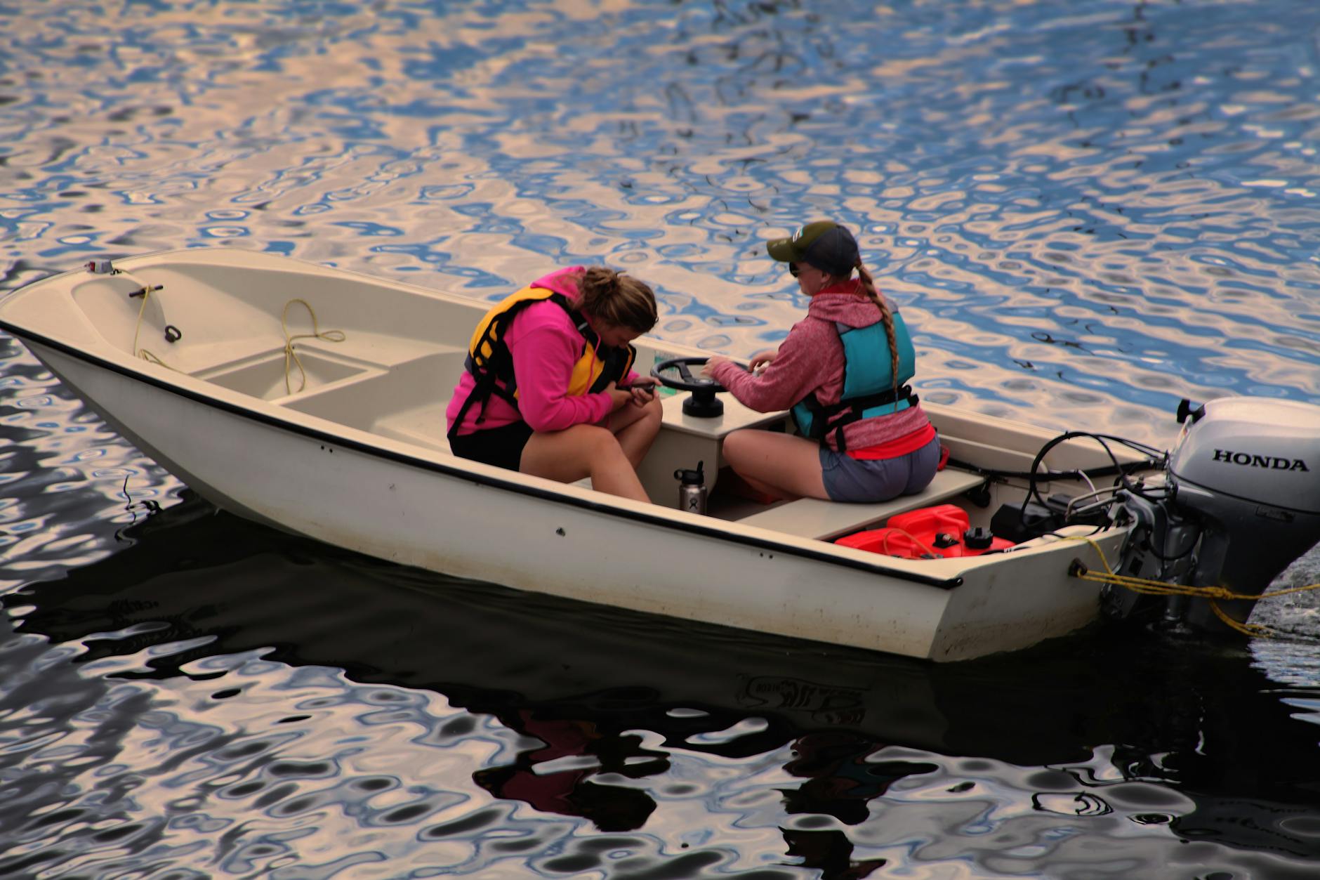 Insurance for Recreational Vehicles: two women in a fishing boat