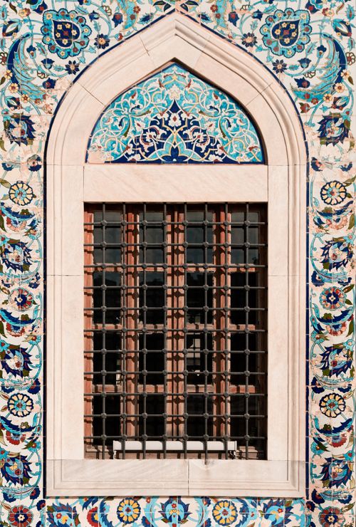 Free Detail of traditional Ottoman-style window with vibrant mosaic tiles in İzmir, Turkey. Stock Photo