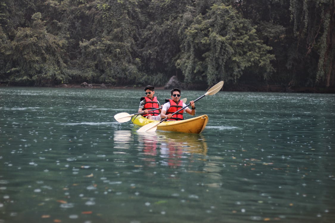 Photo of Two People in Kayak