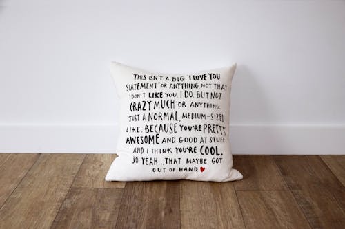 Free A pillow with a quote on it Stock Photo