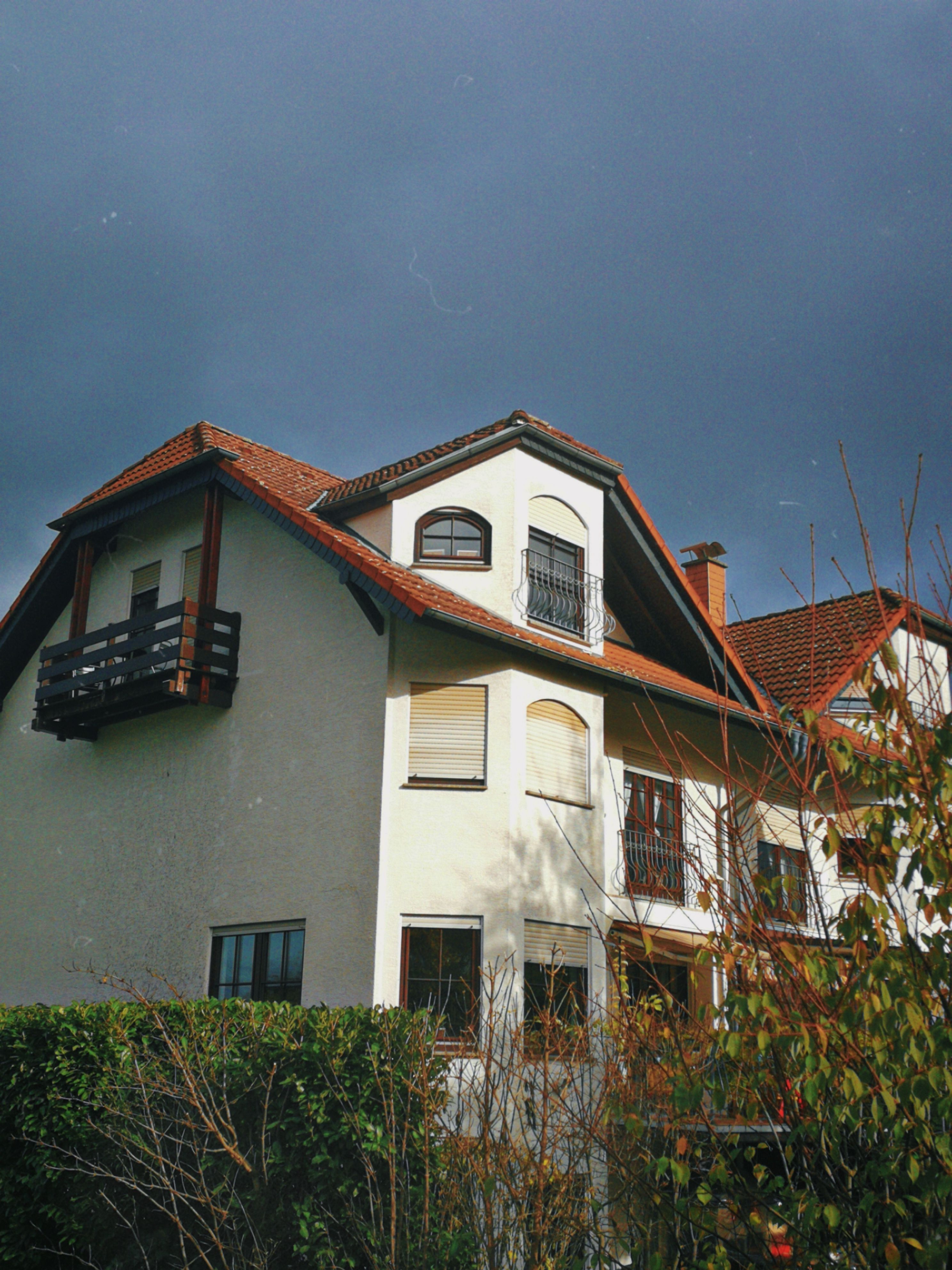 Traditional House against Blue Sky · Free Stock Photo