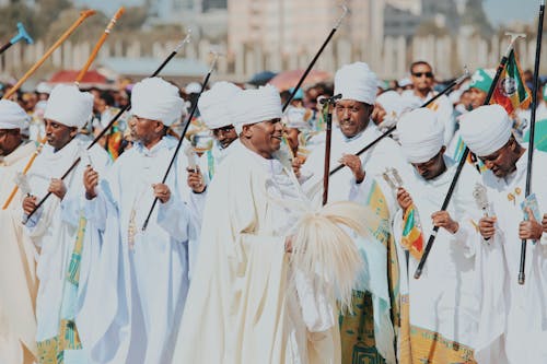 Men in Traditional Clothing on Ceremony