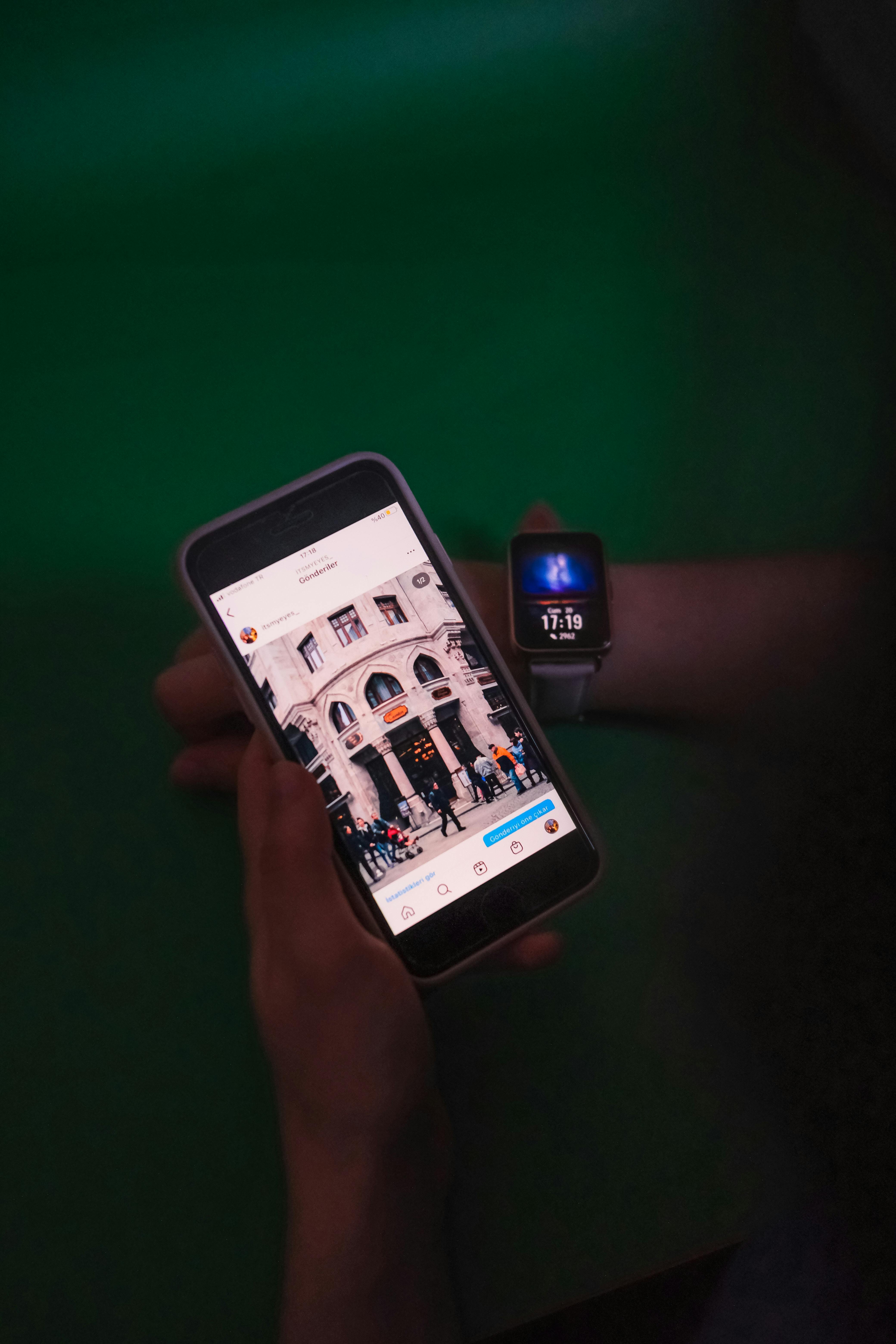 A smartwatch and phone positioned for setup, reflecting the final checks after a reset and before restoring normal use.