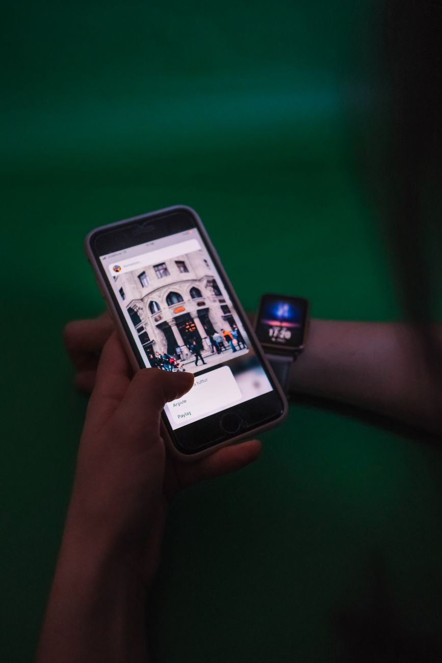 An Apple Watch and iPhone ready for a reset decision, showing the kind of paired-device setup needed before wiping the watch.
