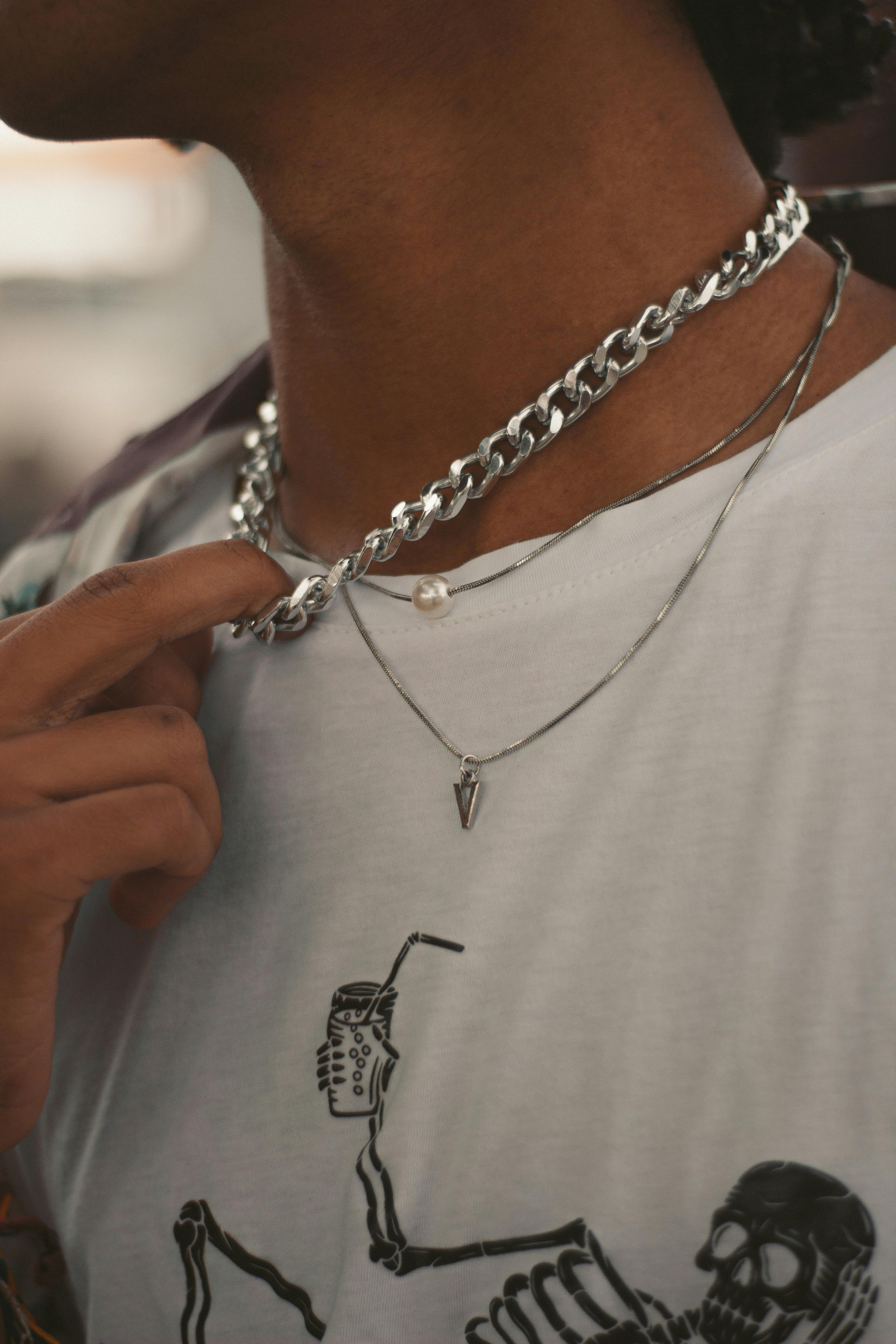 Close Up Photo of a Man Wearing Chain Necklace · Free Stock Photo