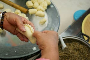 Woman Hands Making Dumplings