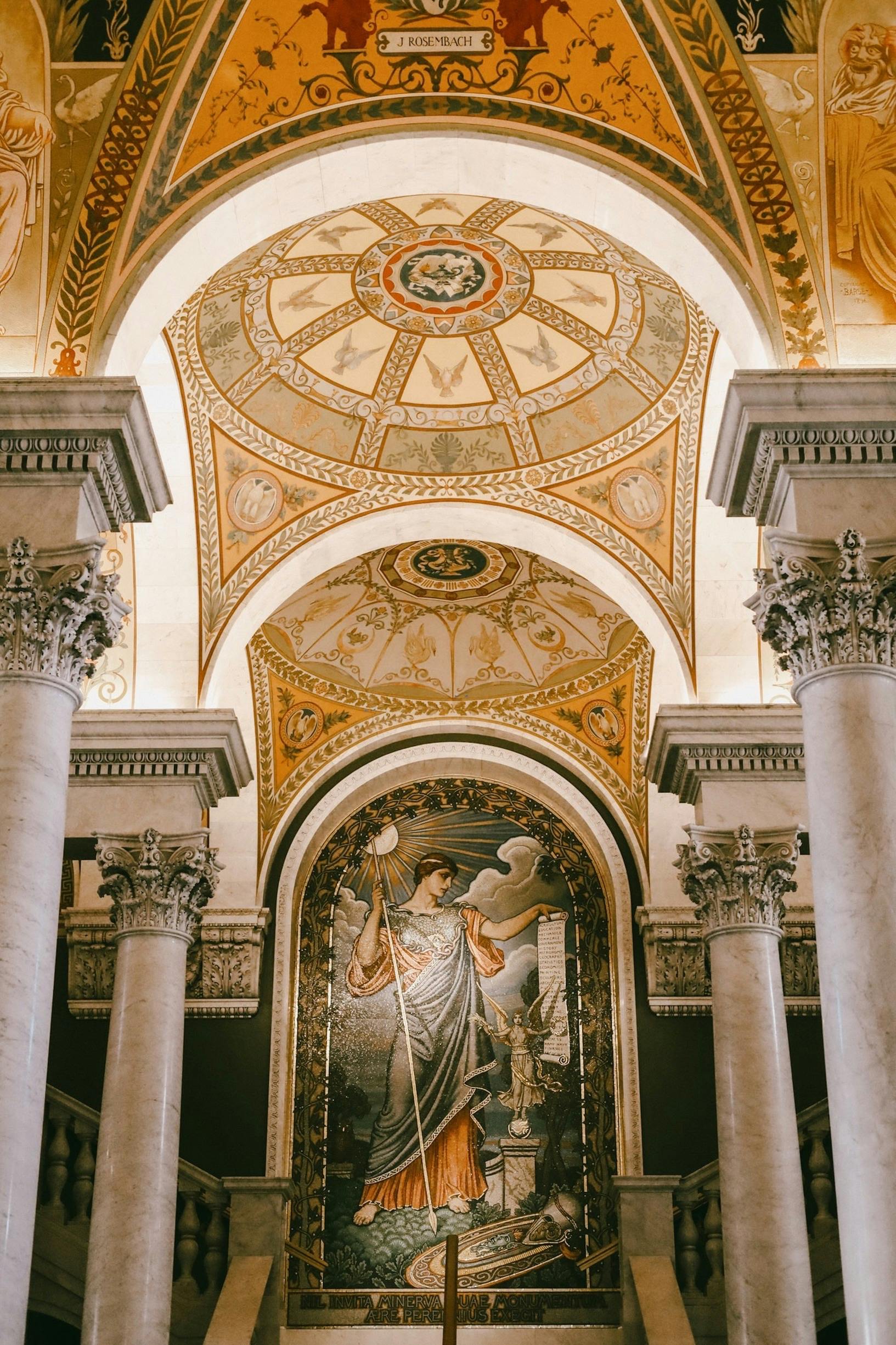 the ceiling of a church with a painting on it